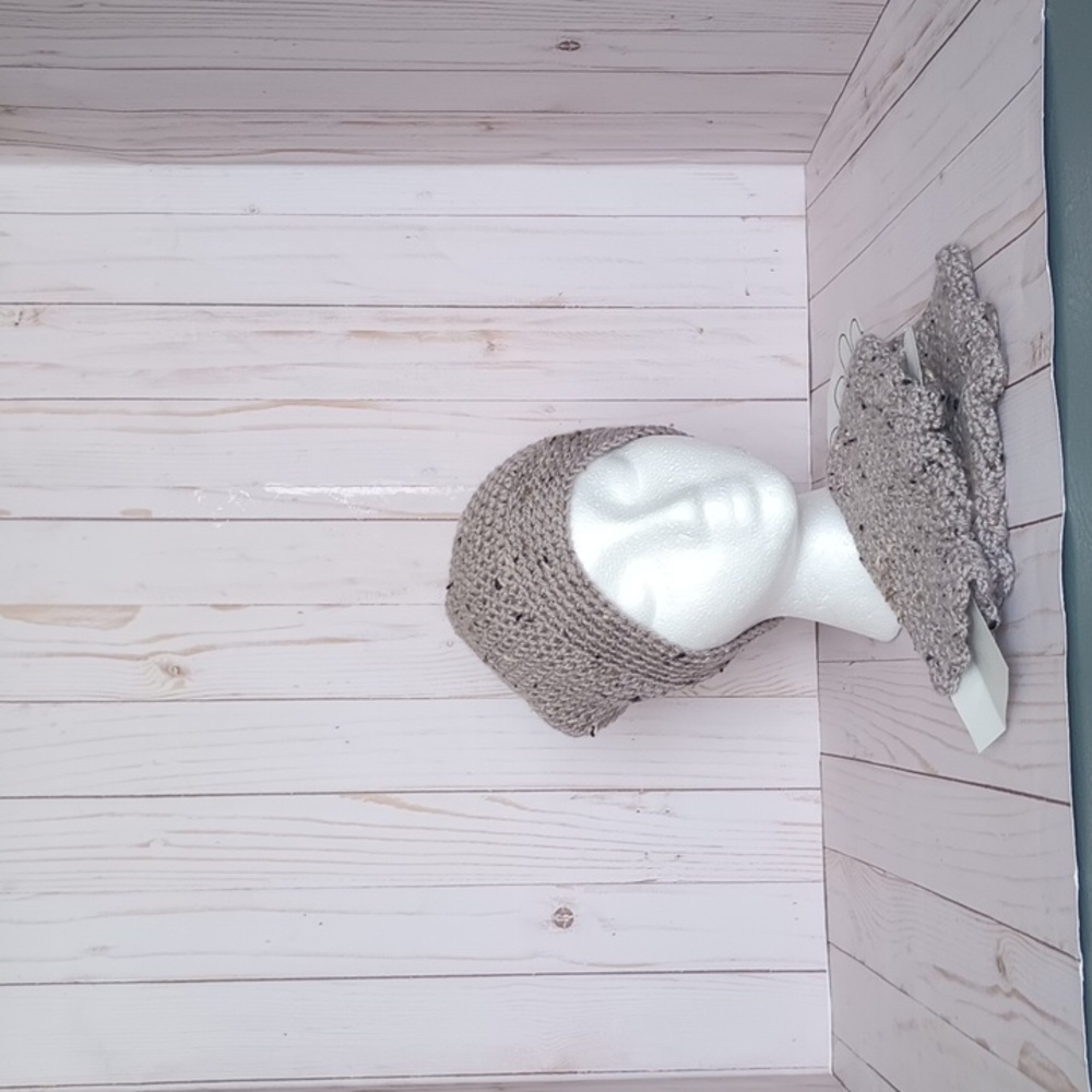 Hand crocheted beanie with a faux fur pom and fingerless glove set.